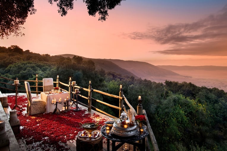 &Beyond Ngorongoro Crater Lodge Header-romantic-dinner-with-rose-petals-overlooking-the-ngorongoro-crater-on-a-luxury-tanzania-safari