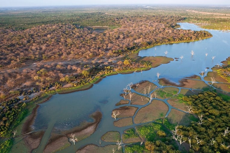 &Beyond Sandibe Okavango Safari Lodge aerial-view-of-the-okavango-delta-channels-and-landscape