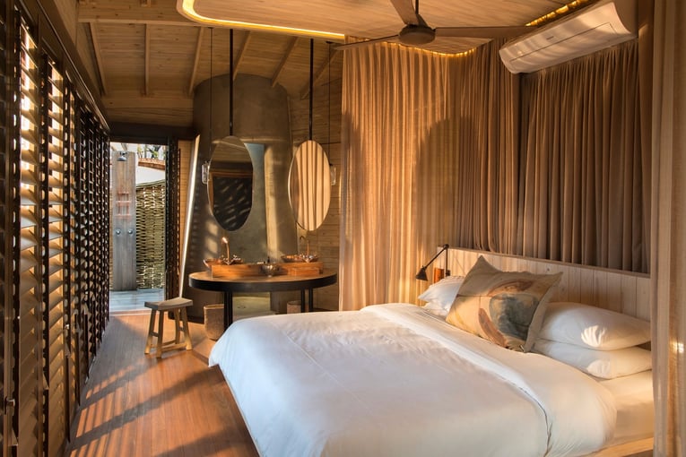 &Beyond Sandibe Okavango Safari Lodge intimate-family-suite-at-andBeyond-sandibe-elevated-above-the-landscape-feauturing-the-okavango-delta-in-Botswana