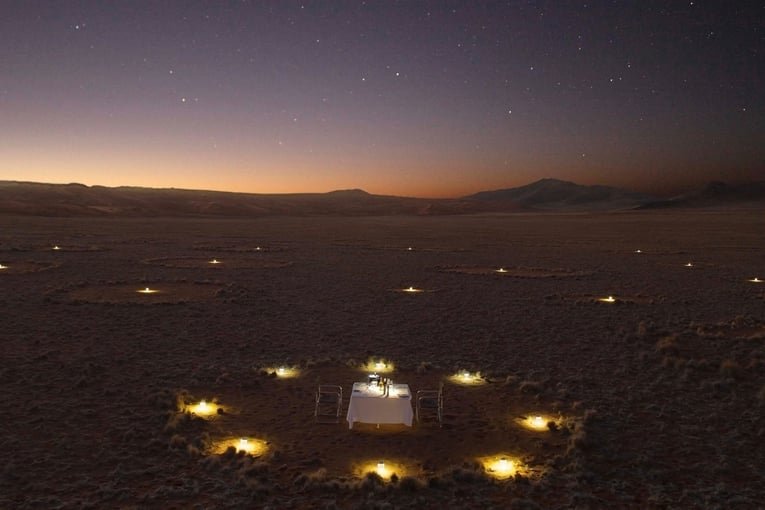 &Beyond Sossusvlei Desert Lodge dining-in-a-fairy-circle-in-namibia