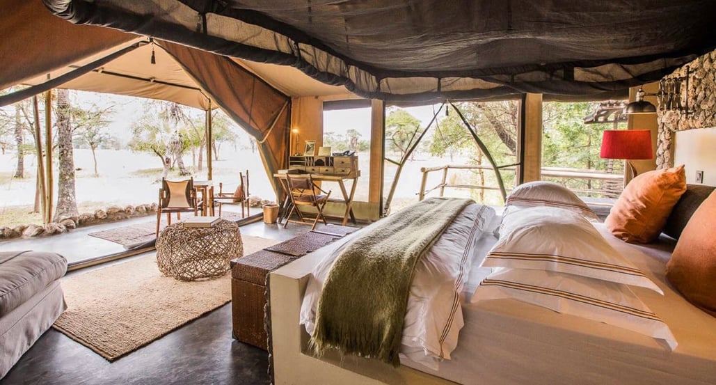 1032x554 Chem Chem 63495747c486e27394edba21_Chem-Chem-Lodge-Safari-Tanzania-Accommodation-Luxury-Bedroom-Tented-Suite