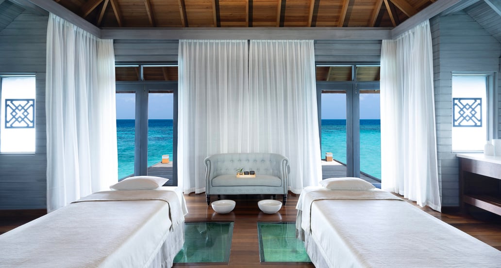 1032x554 Huvafen Fushi Maldives Huvafen-Fushi-Spa-Overwater-Treatment-Room-3-scaled