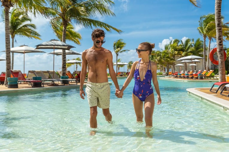 Andaz Mayakoba Resort Riviera Maya Andaz-Mayakoba-Resort-Riviera-Maya-P414-Beach-Pool-Couple.16x9