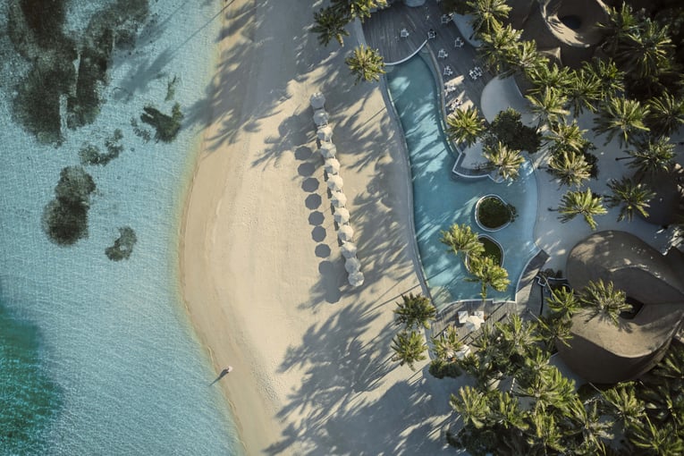 COMO Maalifushi Aerial_Beach and Pool-min