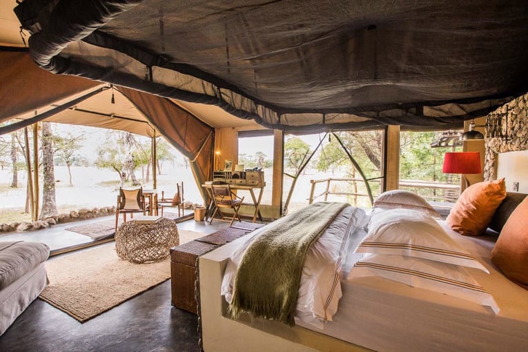 Chem Chem 63495747c486e27394edba21_Chem-Chem-Lodge-Safari-Tanzania-Accommodation-Luxury-Bedroom-Tented-Suite