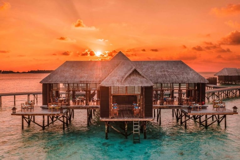 Conrad Maldives Mandhoo-Spa-Restaurant-Sunset-Shot-Drone-1063x614