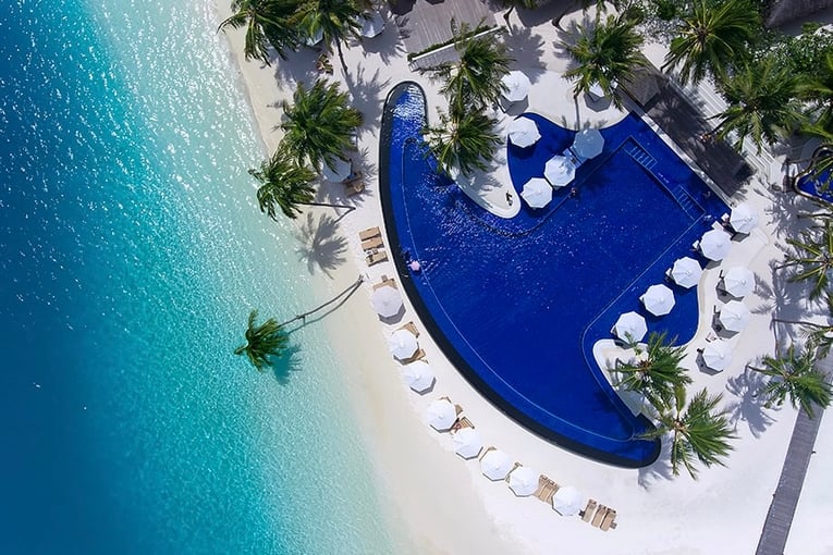 Conrad Maldives main-pool-aerial-view-1063x614