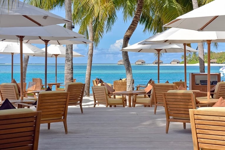 Conrad Maldives rangali-bar-tables-1063x614