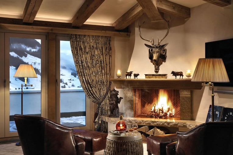 Gstaad Palace gstaad_palace-luxury-hotel-switzerland-penthouse_three_bedroom_suite_fireplace_1_favourite_300dpi_rgb