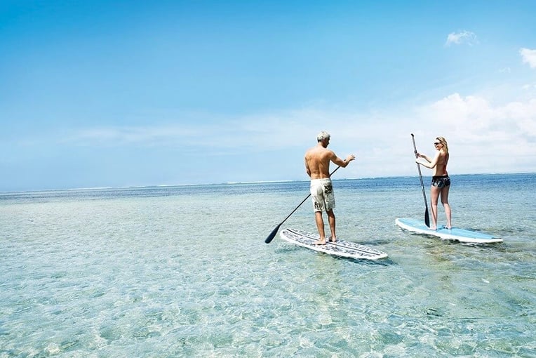 Heritage Le Telfair Golf & Wellness Resort stand-up-paddle-things-to-do-mauriius-for-couples