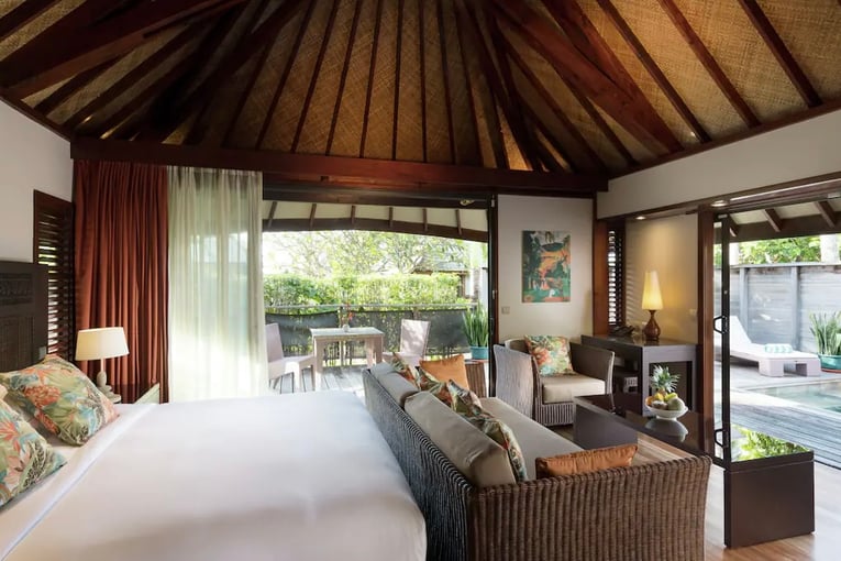 Hilton Moorea Lagoon Resort 45-premium-garden-pool-villa-bedroom-01-flower-cushions