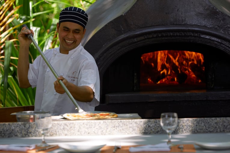 Huvafen Fushi Maldives Huvafen-Fushi-Forno-Restaurant-Wood-Fire-Pizza-Oven-Chef
