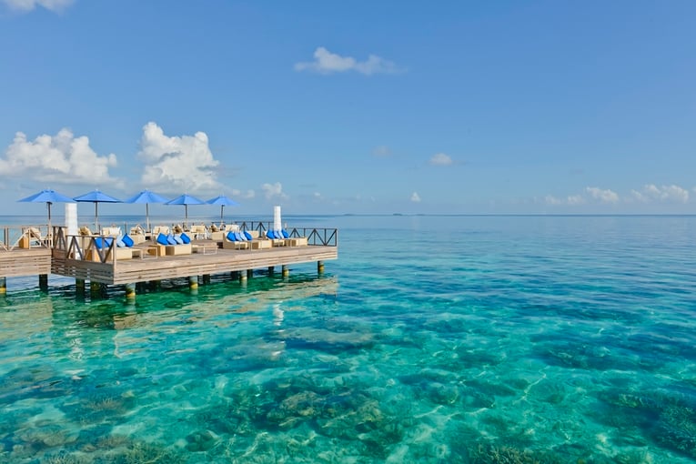 Huvafen Fushi Maldives Huvafen-Fushi-RAW-_-Feeling-Koi-Sunset-Deck-4-1