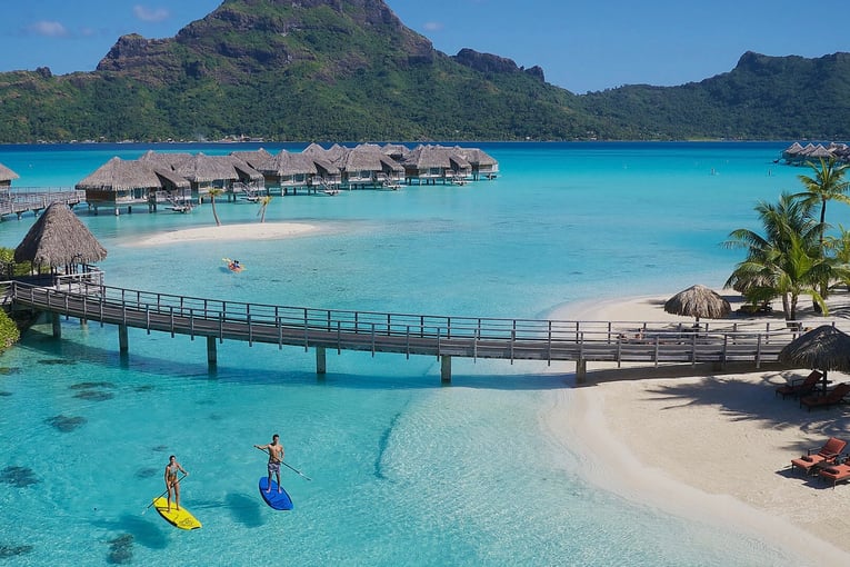 Intercontinental Bora Bora Resort Paddlers-around-the-coral-garden