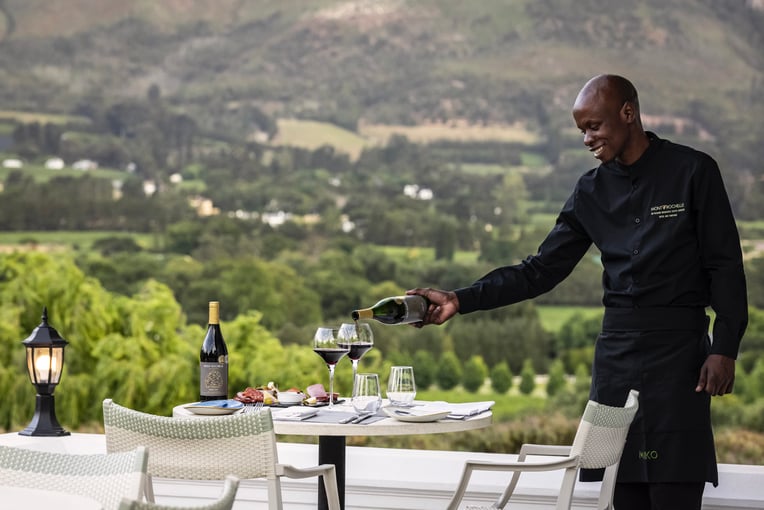 Mont Rochelle mont-rochelle-miko-terrace-dining-with-waiter