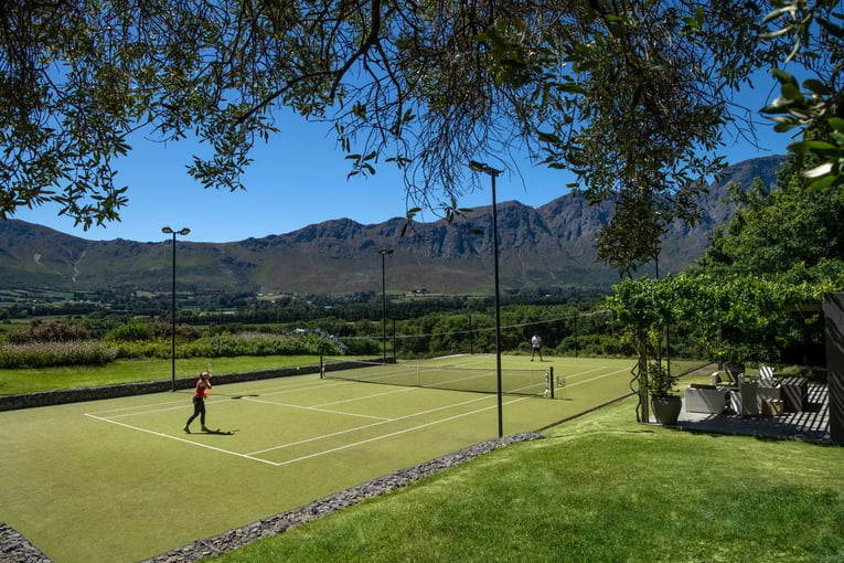 Mont Rochelle mont-rochelle-tennis-court-with-guests-2