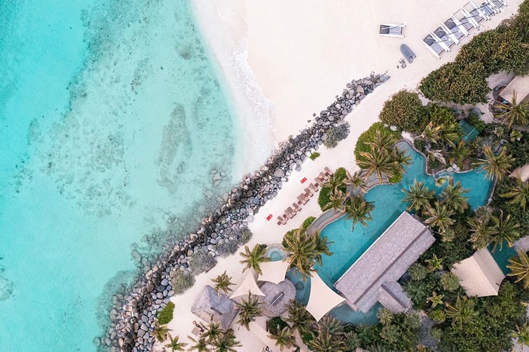 Necker Island necker-island-main-beach-crocodile-pavilion-aerial-1-q90
