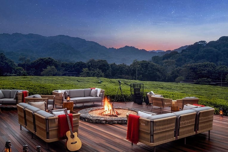 One&Only Nyungwe House oonh-resort-exterior-boma-fire-pit-twilight-portrait