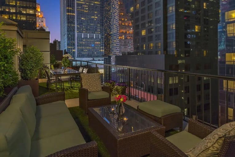 The Chatwal NY NYCUC-P0014-Producer-Suite-Rooftop-Terrace-Evening-View.16x9